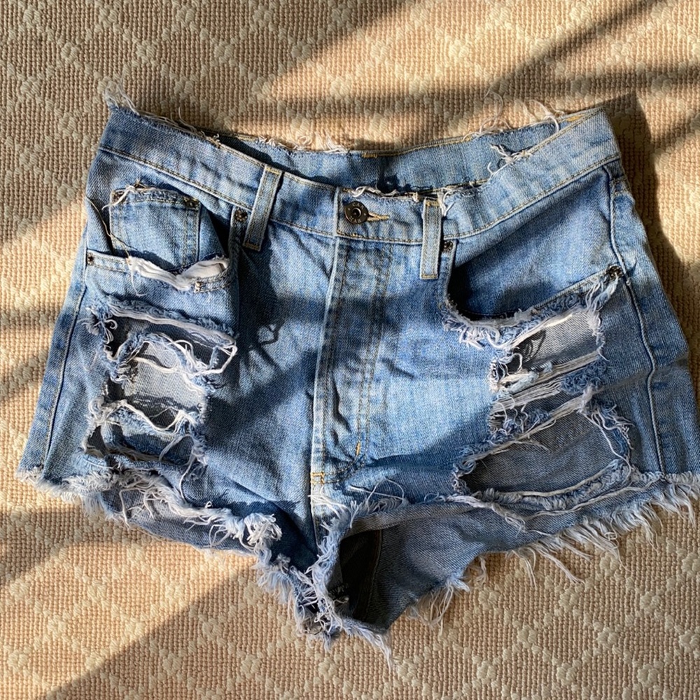 Very ripped denim shorts